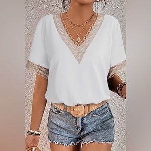 White Blouse with Lace trimming. Polyester